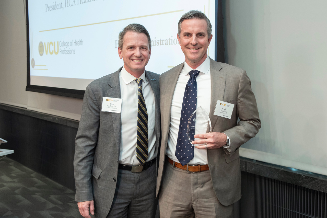 Brent Rawlings, FACHE, MHA ’04, with Chris Accashian, FACHE, MHA ’01, recipient of the 2026 Outstanding Alumnus Award.