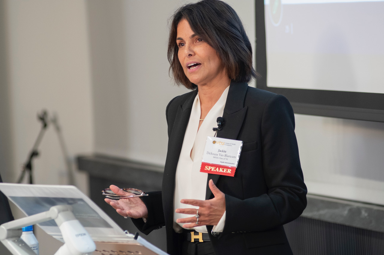 Jackie DeSouza Van Blarincum, VCU MHA ’01 presenting at the Paul A. Gross Landmarks in Leadership Lecture
