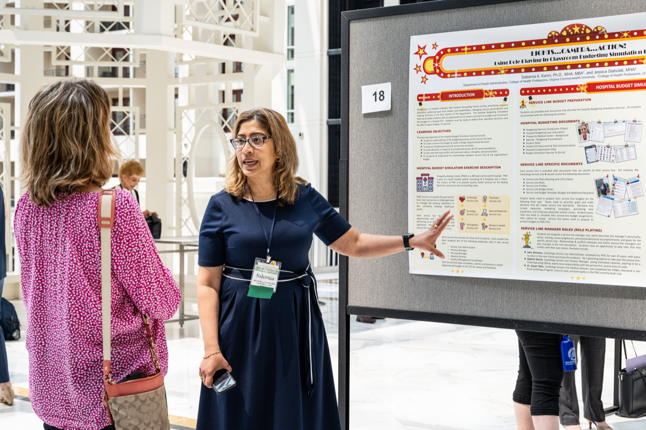 Dr. Saleema Karim presenting her poster at a recent conference