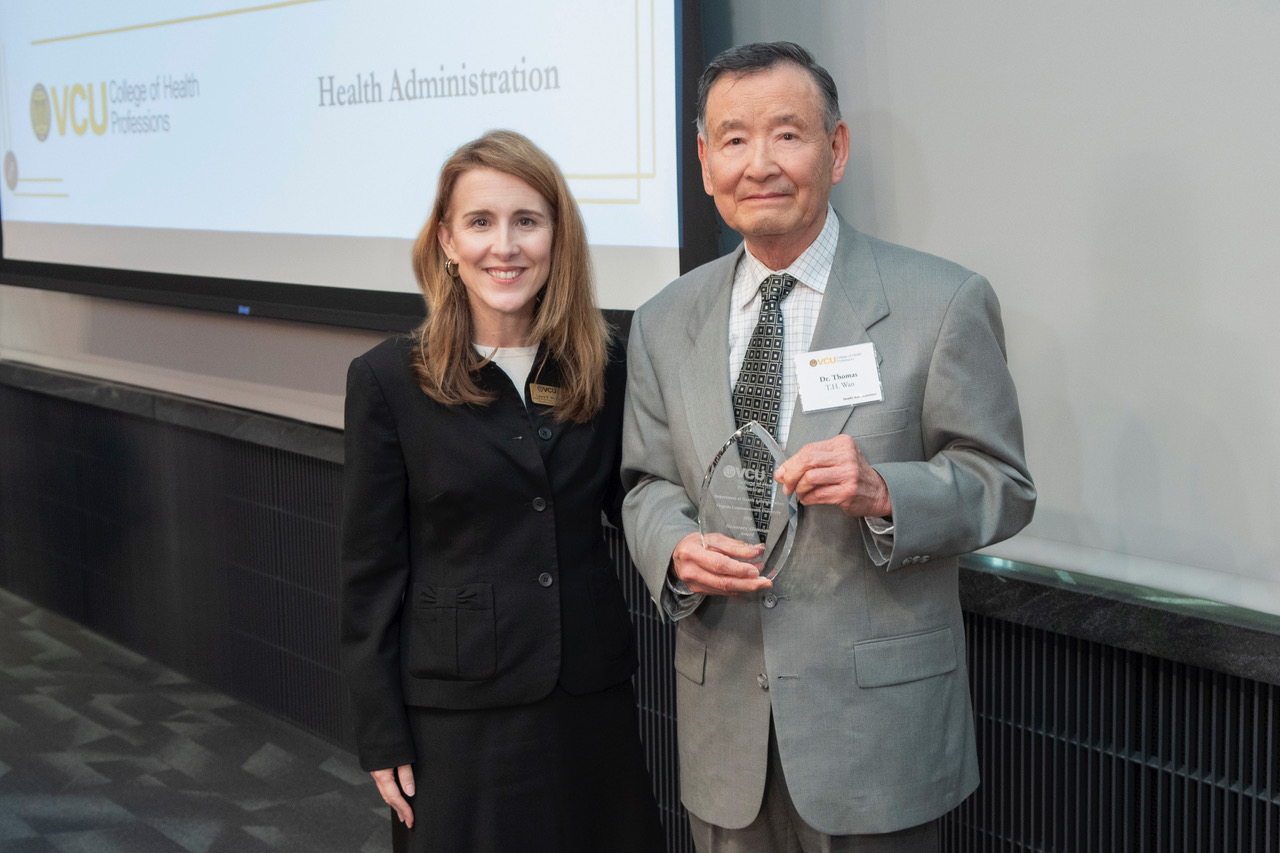 Incoming VCU Health Administration chair Laura McClelland, Ph.D. with Thomas T.H. Wan, Ph.D., the former department chair and recipient of the 2026 Honorary Alumnus Award.
